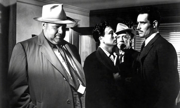 Orson Welles, Victor Millan, Joseph Calleia and Charlton Heston in Touch of Evil (1958)