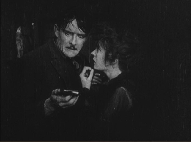 Robert Harron and Mae Marsh in The Mother and the Law (1919)